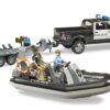 BRUDER 02507 RAM 2500 POLICE PICKUP WITH L AND S MODULE, TRAILER AND BOAT KOUREAS TOYS